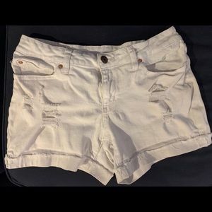 White distressed jean shorts